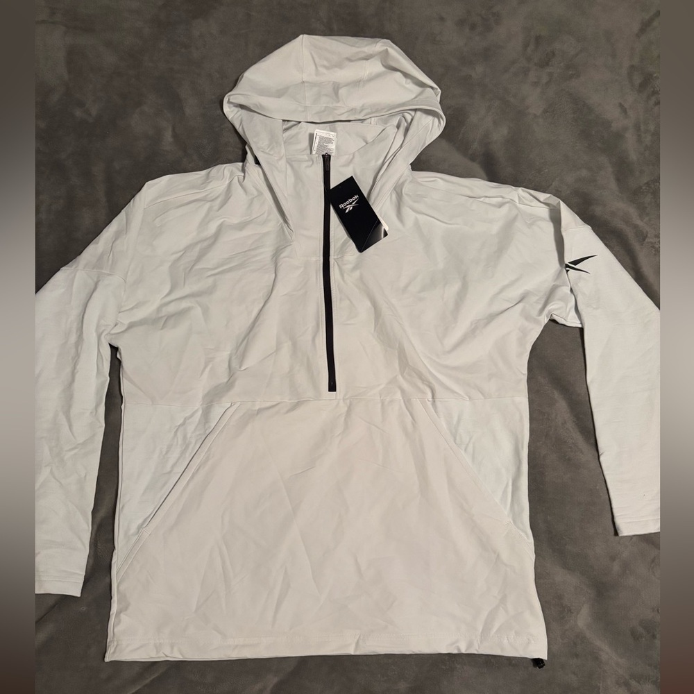 White Reebok wind breaker